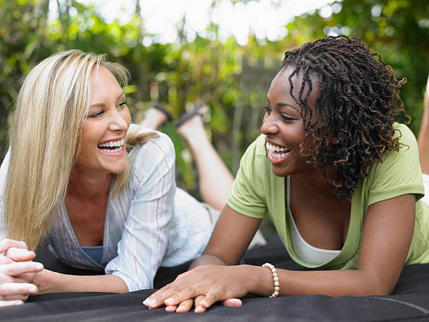 istock Multiethnic Women Laughing Outdoors 526306913