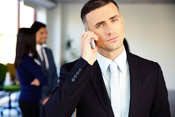 istock Confident businessman talking on the phone 526307985
