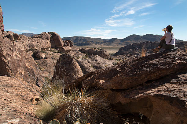 istock Visitor cools off in Hueco Tanks State Park Texas 526308157