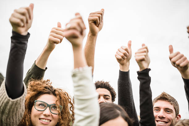 istock Multiracial adult - thumbs up 526308351