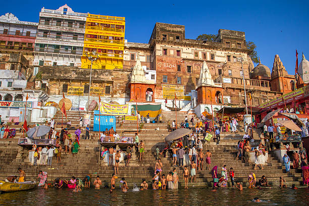 Hindu pilgrims take holy bath in the Ganges river stock photo
