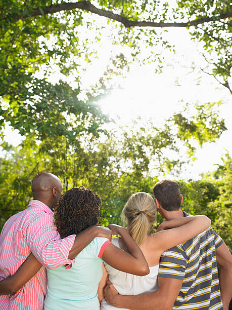 istock Rear view Of Multiethnic Friends With Arms Around 526309341