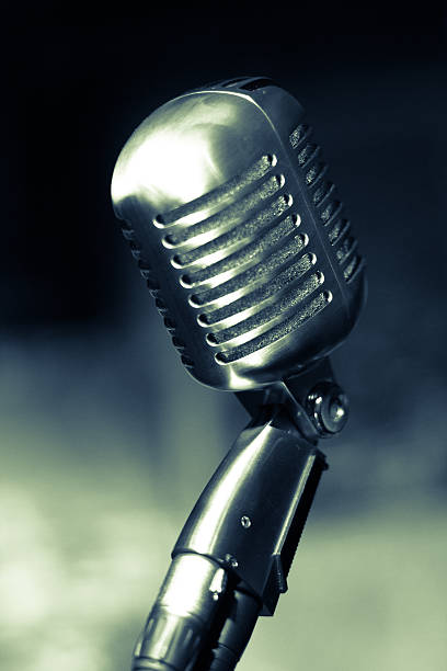 istock Vintage metal Microphone blue toned 526309993