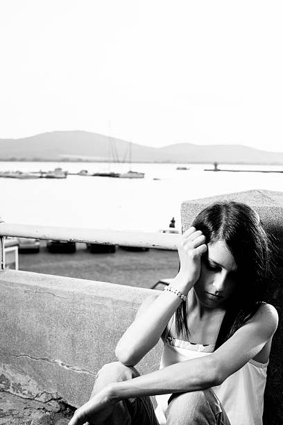 istock Depressed girl outside 526310217