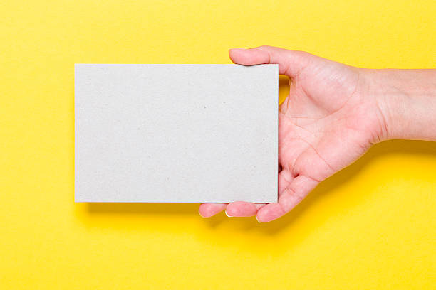 Blank card in a hand XXXL