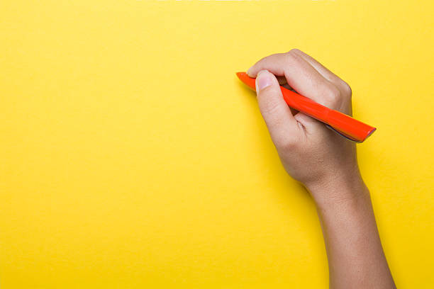 Pen on yellow background XXXL
