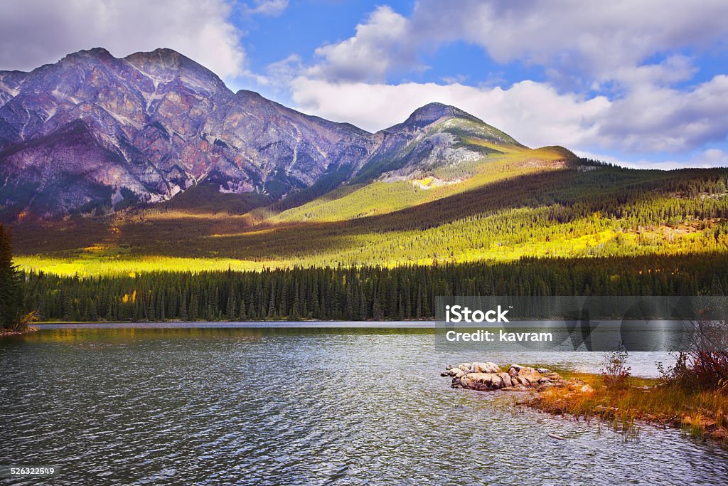 Shallow lake in mountains of Canada Shallow lake in rocky mountains of Canada Blue Stock Photo