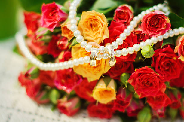 istock Bride bouquet and wedding rings 526323325