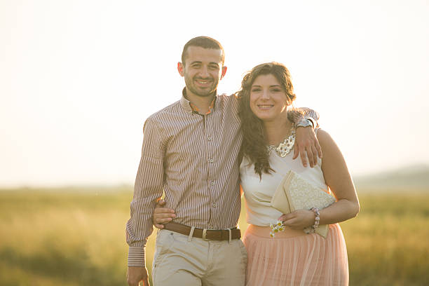 istock Happy young couple posing outdoors 526323821