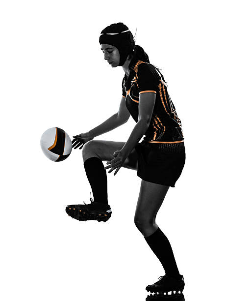 istock rugby woman player silhouette 526327399