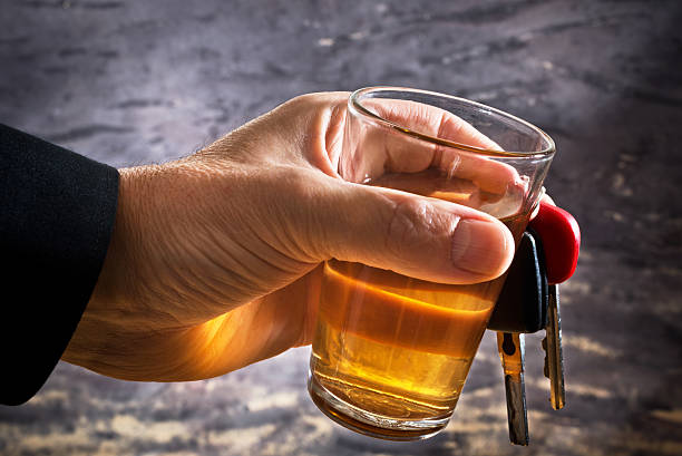 istock man behind car key and glass 526352941