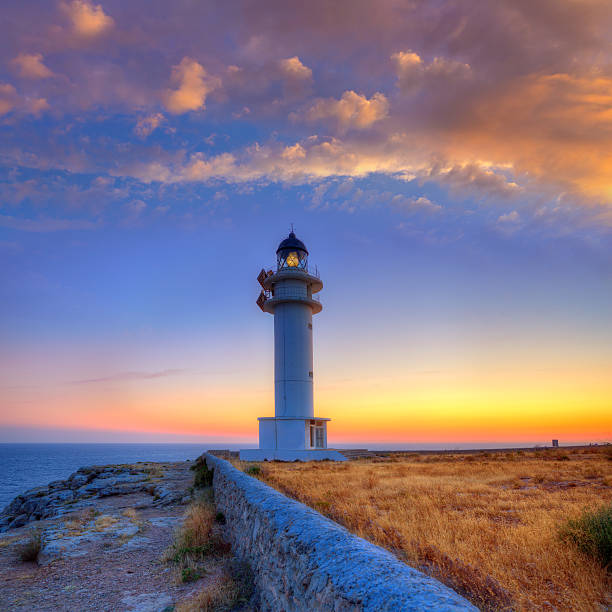 istock Formentera sunset in Barbaria cape lighthouse 526352963