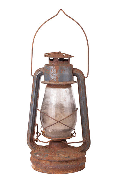 istock old dirty kerosene lamp isolated on white background 526354335