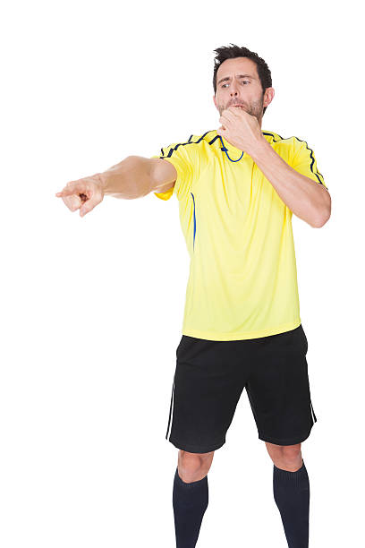 istock Soccer judge whistling 526354341