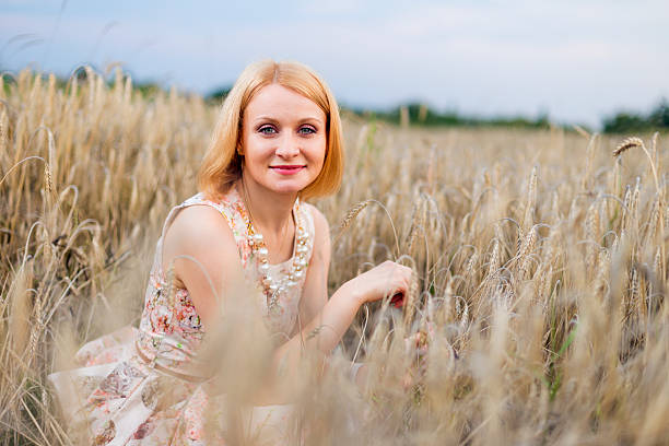 istock Girl in a wheat field 526354917
