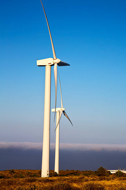 istock spain house  wind turbines and the sky 526355153