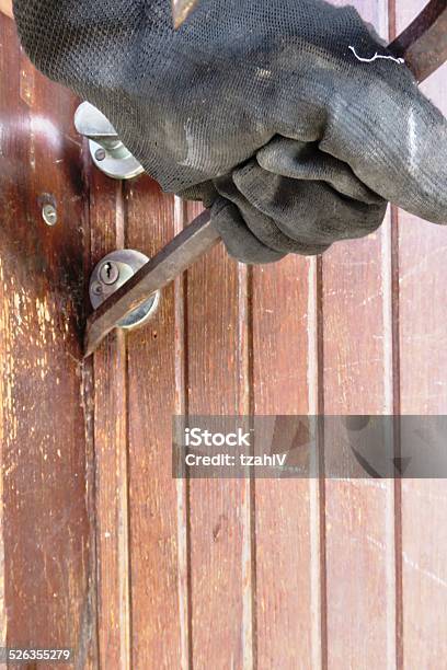 Burglar Hand Holding Crowbar Break Opening Door Stock Photo - Download Image Now - Crowbar, Thief, Door
