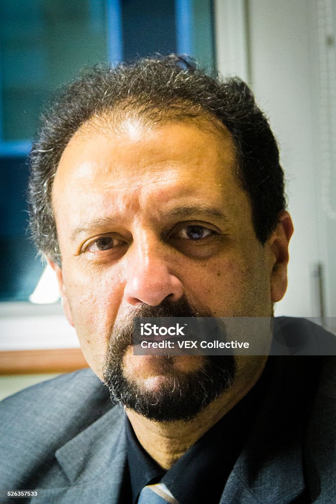 Arabian business man A business man from arabian decent, smiling and bearded. Photo taken indoors in Brussels. Adult Stock Photo