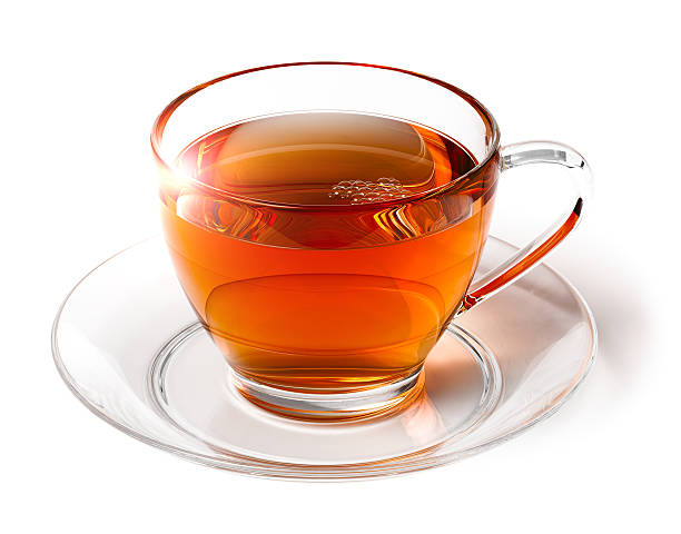 istock Shining cup of tea isolated on white 526372411