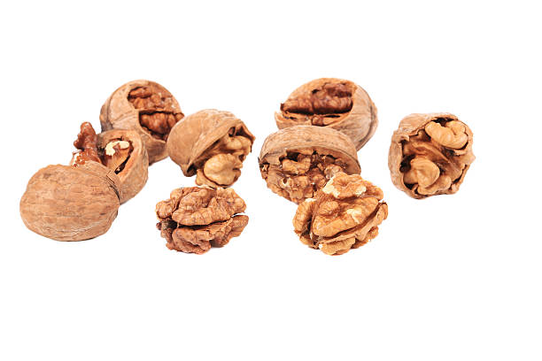 istock Bunch of cracked walnuts. 526375775