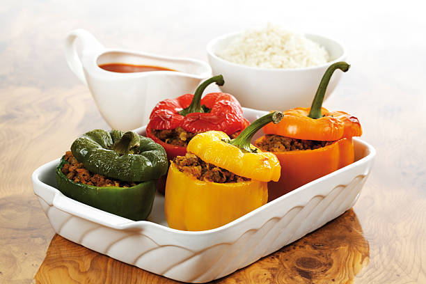 istock Bell pepper filled with minced meat, rice tomato sauce 526388397