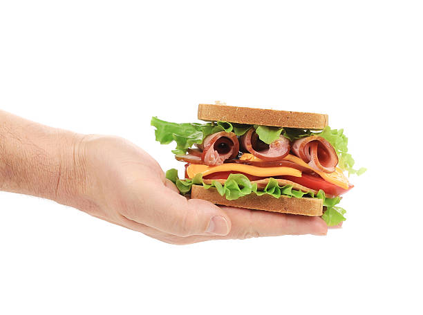 istock Hand holds french toast sandwich. 526389567