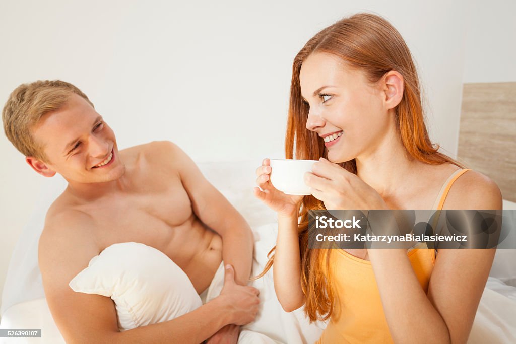 Nice begining of the day A couple begin day together with coffee Adult Stock Photo