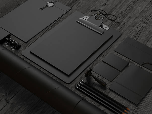 istock Black  branding elements on black wood background 526390925