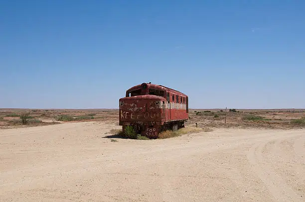 Abandoned red locomotive in Marree, South Australia