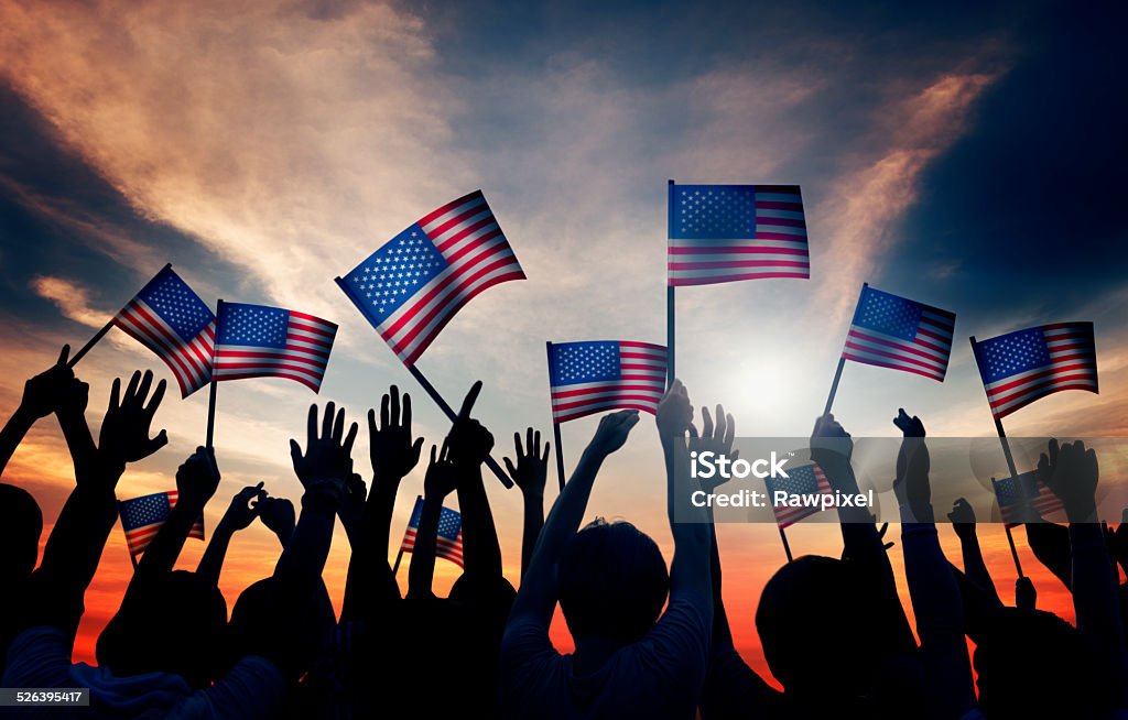 Crowd Holding The American Flag American Flag Stock Photo