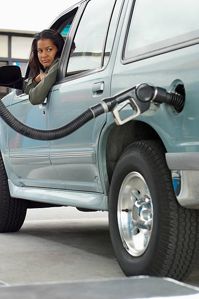 Refueling a car at a fuel station