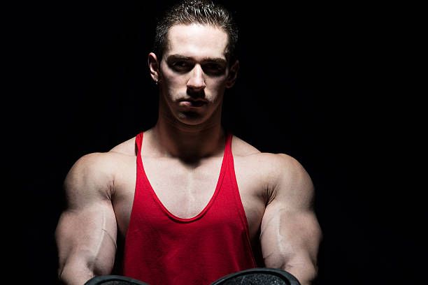 istock Portrait Of A Bodybuilder Isolate on Black Background 526420441
