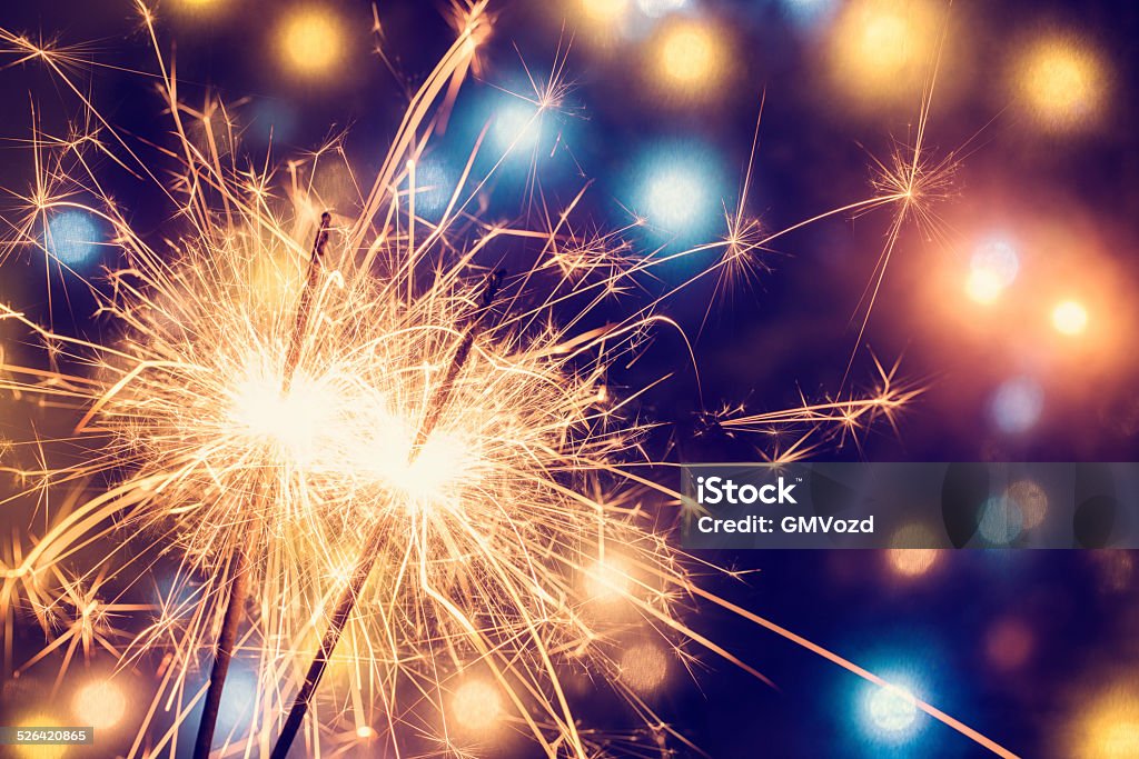 Party Feeling with Sparklers Party feeling with sparklers, a great way to make a celebration unforgettable Sparkler - Firework Stock Photo