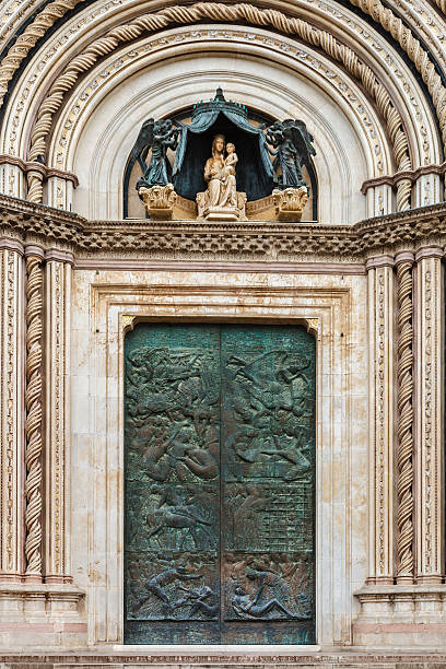 Orvieto is a town in the province of Terni, southwestern Umbria, Italy, dramatic located on the flat summit of tuff cliffs and surrounded by defensive walls built of the same stone called Tufa. One of its main sights is the Cathedral, whose construction began in 1290 by Pope Nicholas IV and ended only in the second half of 1500 with the completion of the façade. The cathedral is a masterpiece of Italian Gothic architecture, with the facade decorated with bas-reliefs, sculptures and mosaics, and the interior decorated with frescoes and other works dating from the thirteenth and fourteenth century.