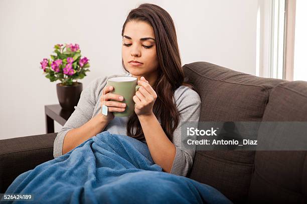 Enjoying Tea On A Cold Day Stock Photo - Download Image Now - 20-29 Years, Adult, Beautiful People