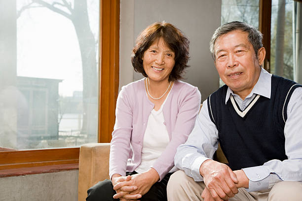 istock Mature Chinese Couple Sitting 526424817