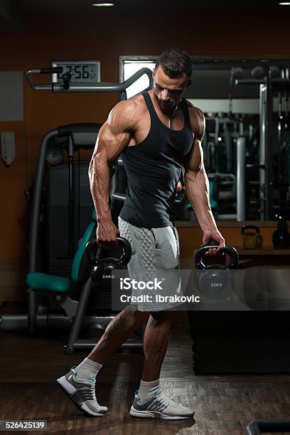 Kettle Bell Workout Stock Photo - Download Image Now - Males, Weightlifting, Weight Training