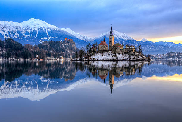 Bled with lake in winter, Slovenia, Europe Amazing sunrise at the lake Bled in winter, Slovenia, EuropeAmazing sunrise at the lake Bled in winter, Slovenia, Europe gorenjska stock pictures, royalty-free photos & images