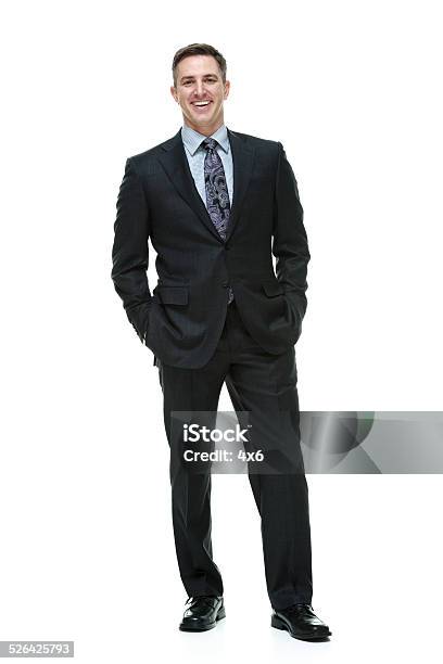 Cheerful Businessman Standing Stock Photo - Download Image Now - 30-39 Years, 35-39 Years, Adult