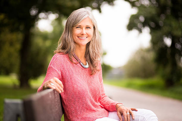 portrait of a smiling  woman outdoors