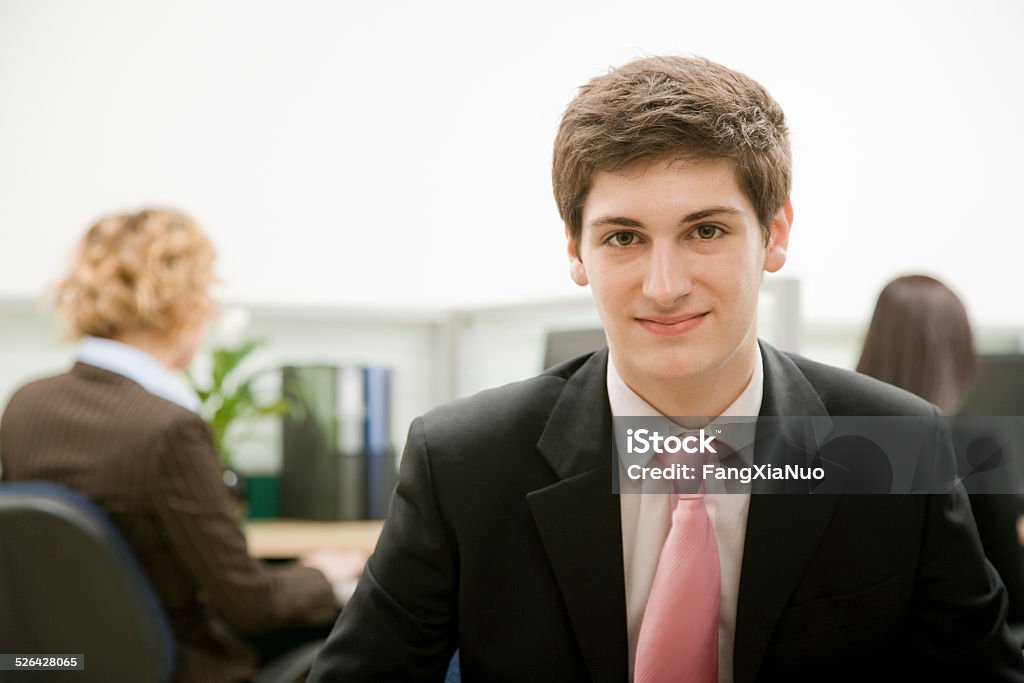 Man Smiling in Office 18-19 Years Stock Photo