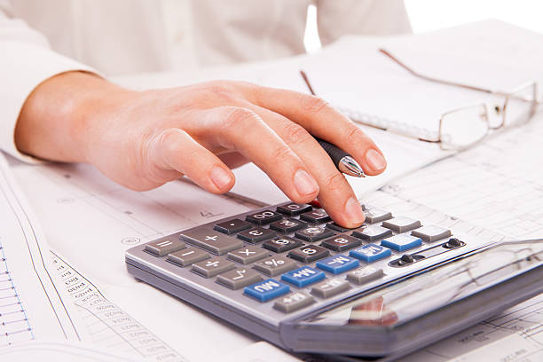 istock Hands of businessman with calculator 526428123