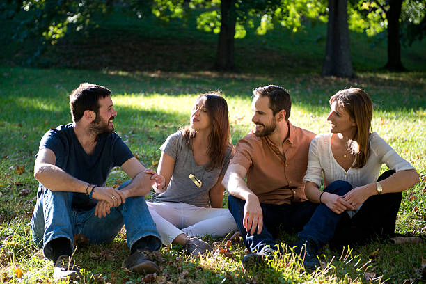 istock group of young friends, enjoying the park. 526440437