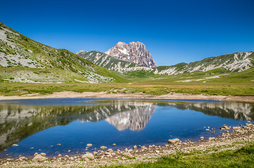 Beautiful landscape with Gran Sasso d'Italia peak at Campo Imperatore plateau in the Apennine Mountains, Abruzzo, Italy