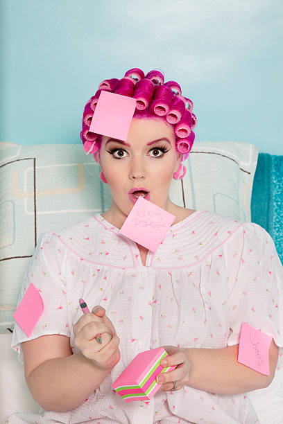 istock Plus size woman in curlers 526443545