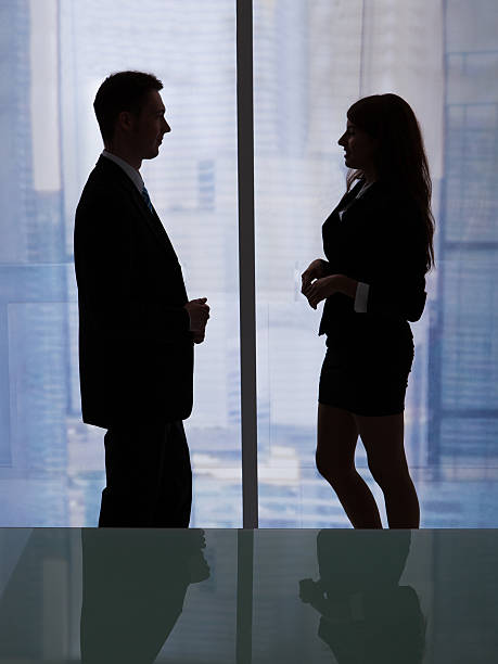 istock Business People Discussing By Office Window 526444957