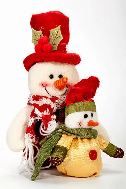 two wrapped-up snowmen as christmas tree decorations