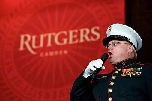 Camden, NJ, USA - May 23, 2013; At the opening of the commencement ceremony of Rutgers University Camden, William Mead brings the Star-Spangled Banner.