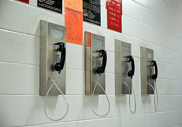Philadelphia, PA, USA - February 21, 2014; These four landline telephones are available to inmates in a public area of the Philadelphia Prison System (PPS) in the NorthEast section of Philadelphia. (photo by Bas Slabbers)