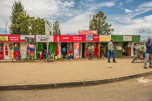 Naivasha, Kenya - October 18, 2014 : Typical shopping street scene with pedestrians in Naivasha, Kenya